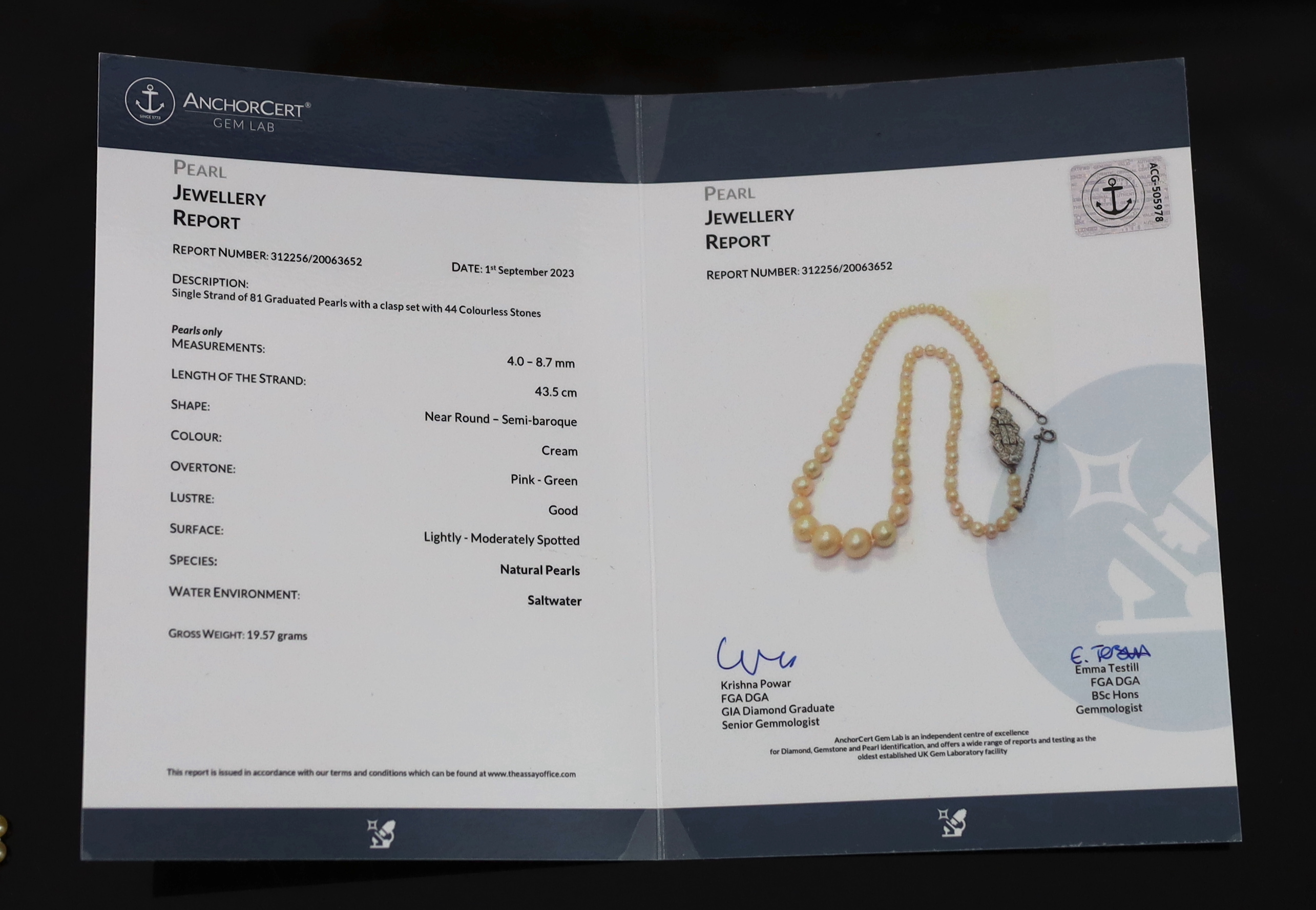 An Edwardian single strand graduated natural saltwater pearl necklace, with gold, platinum and diamond cluster set clasp, with safety chain